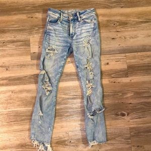 Ripped American Eagle blue jeans